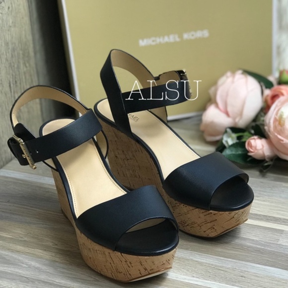 Michael Kors Shoes - Michael Kors Xaria Wedge Leather Black W AUTHENTIC